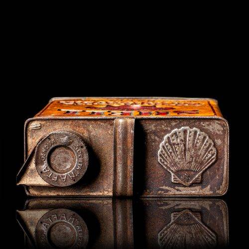 Vintage Shell oil cans with red and yellow branding from the 1900-1920 old logo Vintage Shell oil cans from 1900-19255, featuring the old logo. The photo showcases an antique tin red with yellow accents, displaying the historic Shell emblem. Shot in a studio against a solid black background