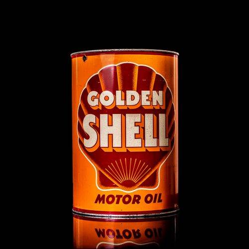 Vintage Shell oil cans with red and yellow branding from the 1900-1920 old logo Vintage Shell oil cans from 1900-19255, featuring the old logo. The photo showcases an antique tin red with yellow accents, displaying the historic Shell emblem. Shot in a studio against a solid black background