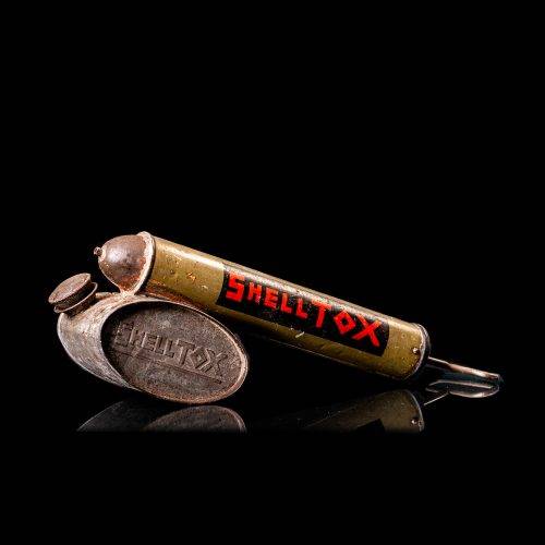 Vintage Shell oil cans with red and yellow branding from the 1900-1920 old logo Vintage Shell oil cans from 1900-19255, featuring the old logo. The photo showcases an antique tin red with yellow accents, displaying the historic Shell emblem. Shot in a studio against a solid black background