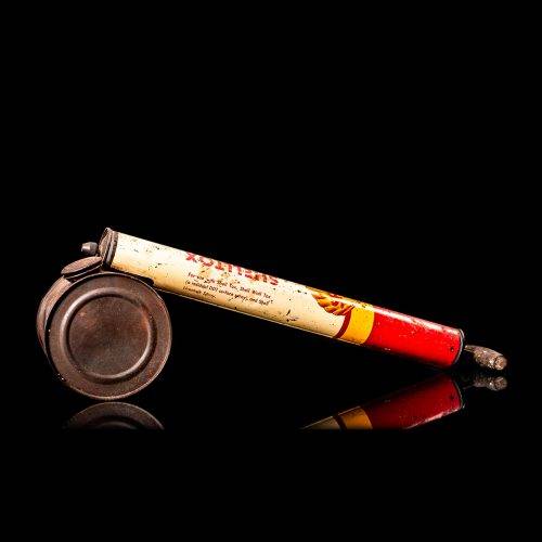 Vintage Shell oil cans with red and yellow branding from the 1900-1920 old logo Vintage Shell oil cans from 1900-19255, featuring the old logo. The photo showcases an antique tin red with yellow accents, displaying the historic Shell emblem. Shot in a studio against a solid black background