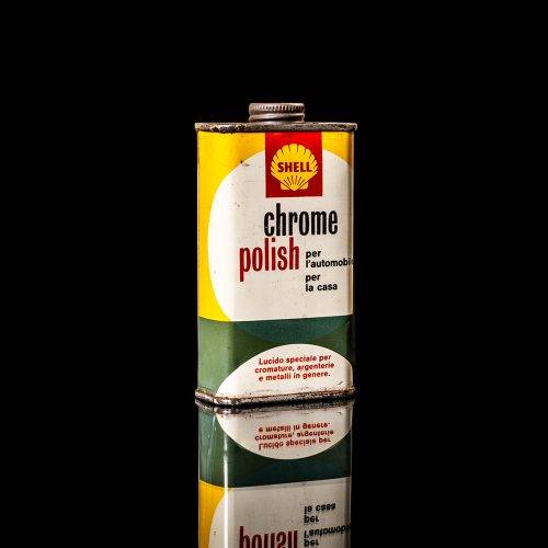 Rare and unique vintage mini Shell oil can from 1900–1950 with red and yellow accents, featuring the classic Shell logo. This small antique tin is displayed in a studio setting against a solid black background." lubricant,cleaner, outboard, motor oil, sealant, valve lubricant, two cycle, glass cleaner oil, shell cans