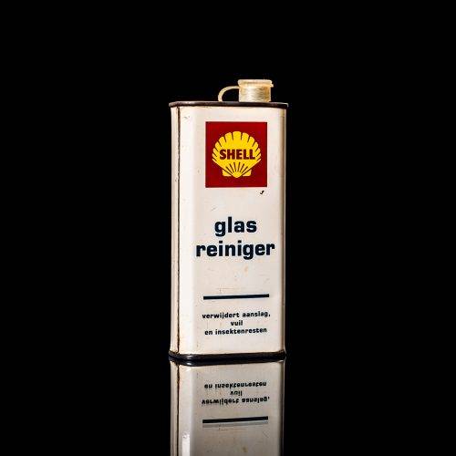 Rare and unique vintage mini Shell oil can from 1900–1950 with red and yellow accents, featuring the classic Shell logo. This small antique tin is displayed in a studio setting against a solid black background." lubricant,cleaner, outboard, motor oil, sealant, valve lubricant, two cycle, glass cleaner oil, shell cans