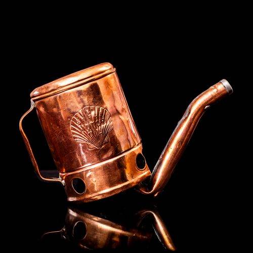 Vintage Shell oil cans with red and yellow branding from the 1900-1920 old logo Vintage Shell oil cans from 1900-19255, featuring the old logo. The photo showcases an antique tin red with yellow accents, displaying the historic Shell emblem. Shot in a studio against a solid black background